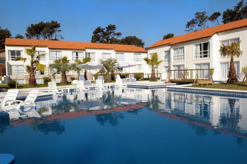 Punta Del Este Arenas Hotel Chihuahua Bagian luar foto